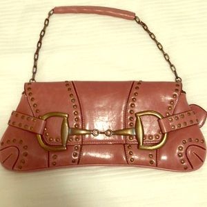 Pink leather clutch